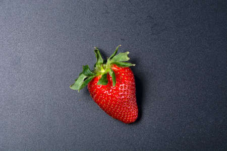 Strawberries on a gray matte background.の写真素材
