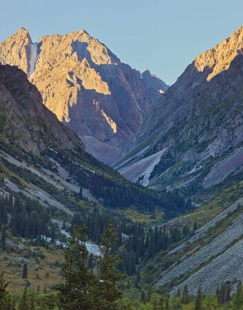 The panorama of mountain landscape of Ala-Archa gorge in the earlier summer's morning, Kyrgyzstan.