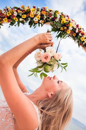 Bride with wedding bouquet, Baliの写真素材