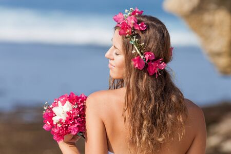 Bride with wedding bouquet, Baliの写真素材