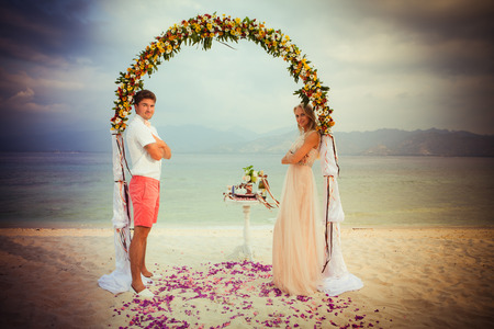 wedding couple just married near the beachの写真素材