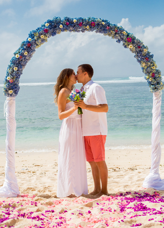 wedding couple near the ocean in Indonesia, Bali islandの写真素材