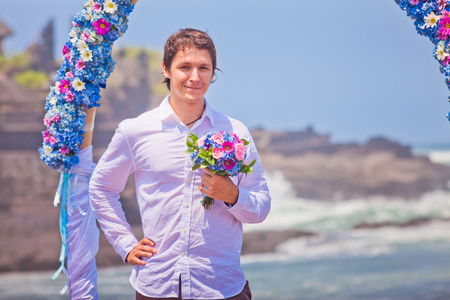 wedding couple just married near the beach at Baliの写真素材
