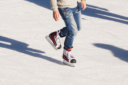 Image of teenager who are ice skating in the ice rink at the Medeoの写真素材