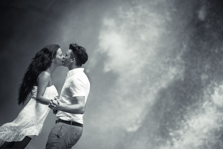 retro revival photo of couple travels to balinese waterfallの写真素材