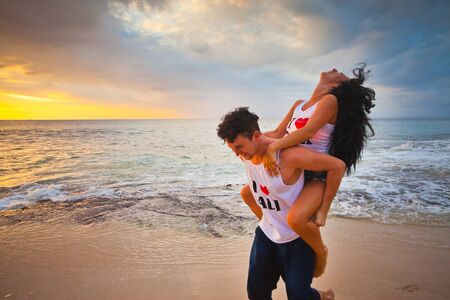 happy wedding couple on the beachの写真素材