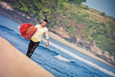 concept of office businessman with surf near the oceanの写真素材