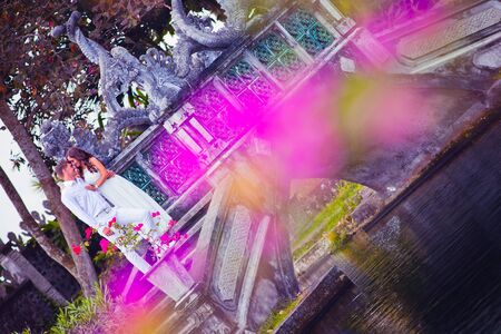 honeymoon couple at the park of Baliの写真素材