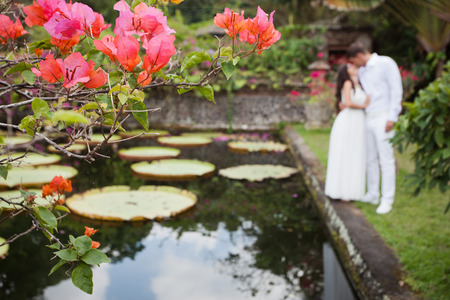honeymoon couple at the park of Baliの写真素材