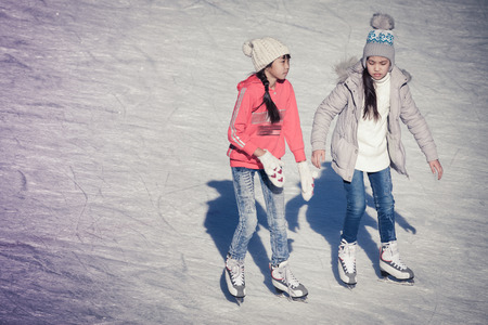 Image of group of children on the ice skating at the Medeoの写真素材