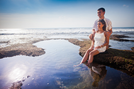 honeymoon couple at blue beachの写真素材