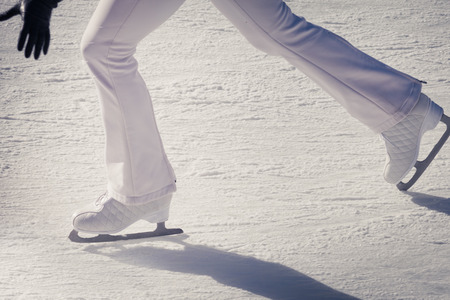 Image of teenager who are ice skating in the ice rink at the Medeoの写真素材