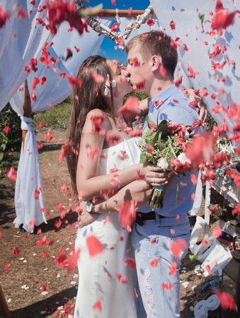wedding couple at flowers backgroundの写真素材