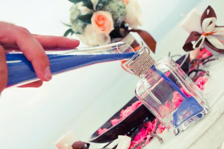 wedding ceremony - mixing sands is a new familyの写真素材