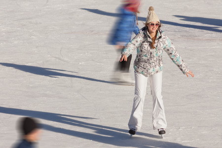 Young girl at the ice rink outdoor at Medeo, Almaty, Kazakhstanの写真素材