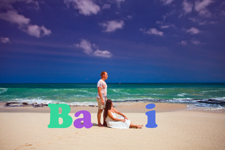 wedding couple with text of Bali, at the beachの写真素材