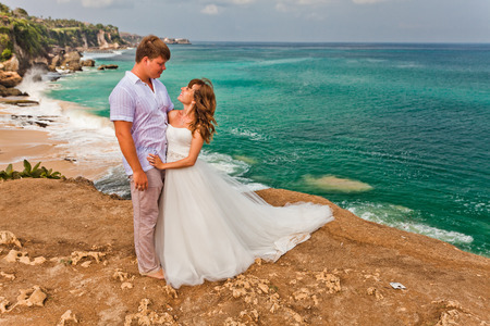 wedding couple just married near the beach at Baliの写真素材