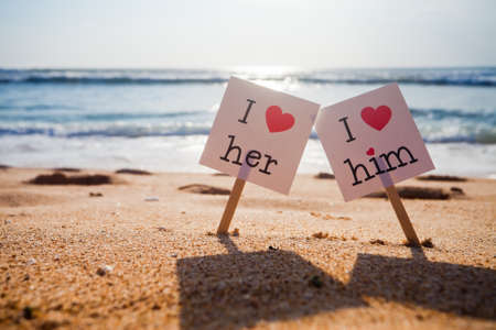 Declaration love concept at the beach with blue sea backgroundの写真素材