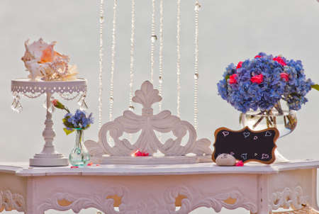 Wedding table with beautiful blue flowers and wedding decorationsの写真素材