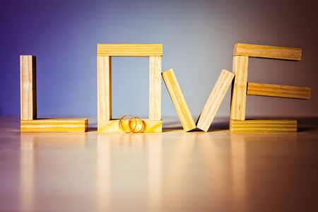 Love abstract background with golden rings for proposingの写真素材