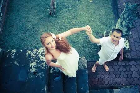 young man makes a proposal to his girlfriendの写真素材