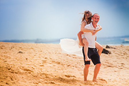 happy couple just married at the beach, Baliの写真素材