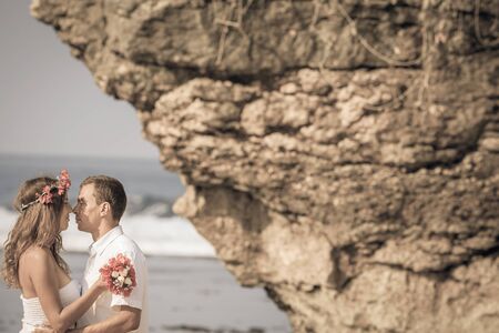 wedding couple near the rock in Hawaii island, USAの写真素材