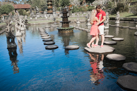 man makes a marriage proposal to his girlfriend, Bali, Water Placeの写真素材