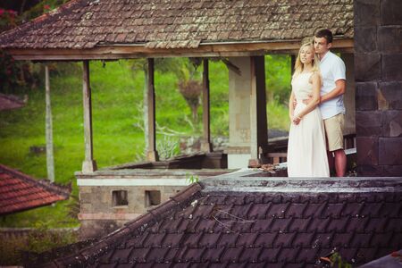 young couple at abandoned hotel in Bali - Taman Rekreasi Bedugul Hotelの写真素材