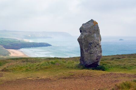 The image of old stone â menhir near wild beach in the coast of Cameret sur Mer, Bretagne, France.の写真素材