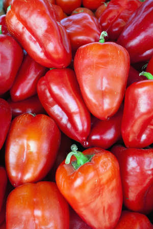 Red sweet bell peppers natural on the background.の写真素材