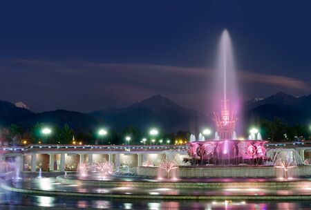 Night long exposure image of big fountain in National Park of first President of Almaty, Kazakhstanの写真素材