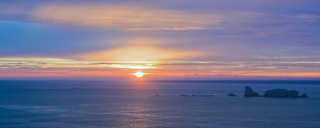 Picture of beautiful sunset with the view of the high cliffs. Bretagne.の写真素材