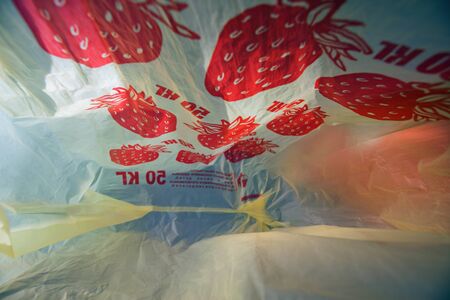 Picture of the plastic bag inside, illuminated by natural light.の写真素材
