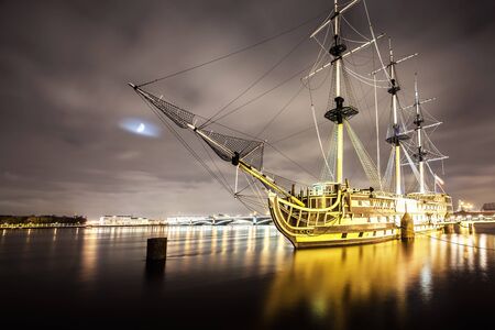 Restaurant at vintage frigate at Saint Petersburg, floating by neva river at night.の写真素材