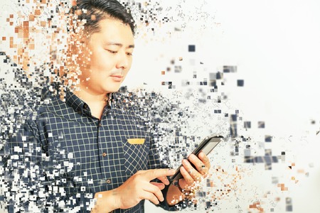 asian businessman using mobile phone or tablet pc at white background for any text. Photoshop, art...