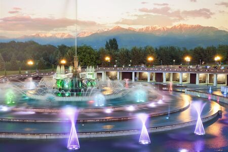 Fountain at Almaty, Kazakhstan. The park of the First President of Kazakhstan. Sunsetの写真素材
