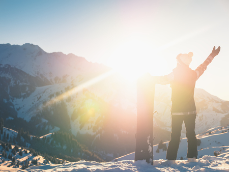 Adventure to winter sport. Snowboarder girlの写真素材