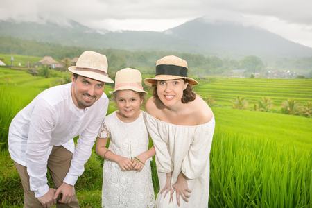Happy family travelers taking selfie at mobile phoneの写真素材