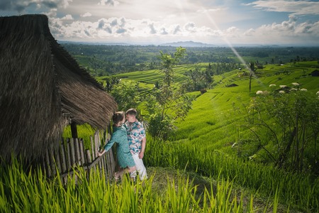 Happy couple traveling at Bali, rice terraces of Jatiluwih, Ubudの写真素材