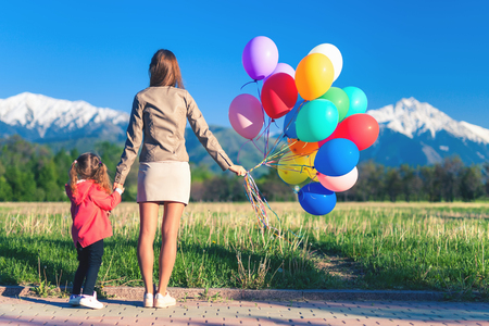 Mothers Day. Happy Mom and baby outdoor. Mother dayの写真素材