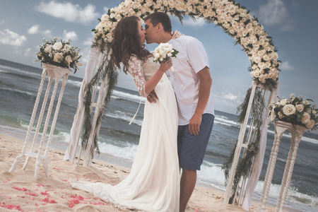 Old Fashion Image Of Wedding Couple Just Married At Beachの写真素材