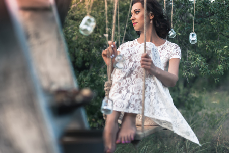 Young Bride Dressed In White Dress Has Just Got Marriageの写真素材
