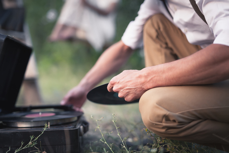 Groom Includes A Vinyl Record On Old Vintage Turntable For Their Romantic Dateの写真素材