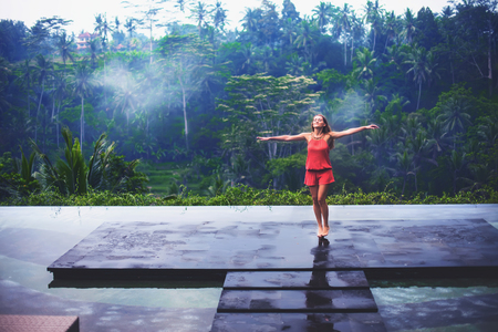 Happy woman at rice terraces in hotel. Bali, Ubud.の写真素材