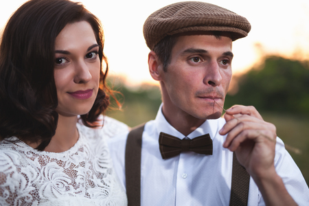 Young Couple Have Got Marriage In Rustic Style In Apple Orchardの写真素材