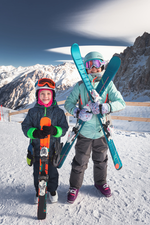 Kids ski lesson in alpine school. Little skier posingの写真素材
