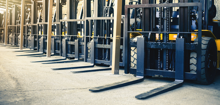 Background of a lot of forklifts, reliable heavy loader, truckの写真素材