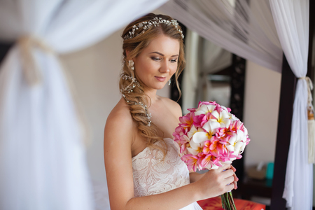 Beautiful bride smile and looking feeling so happiness in wedding dayの写真素材