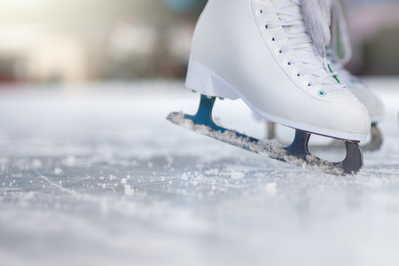 Closeup skating shoes ice skating outdoor at ice rinkの写真素材